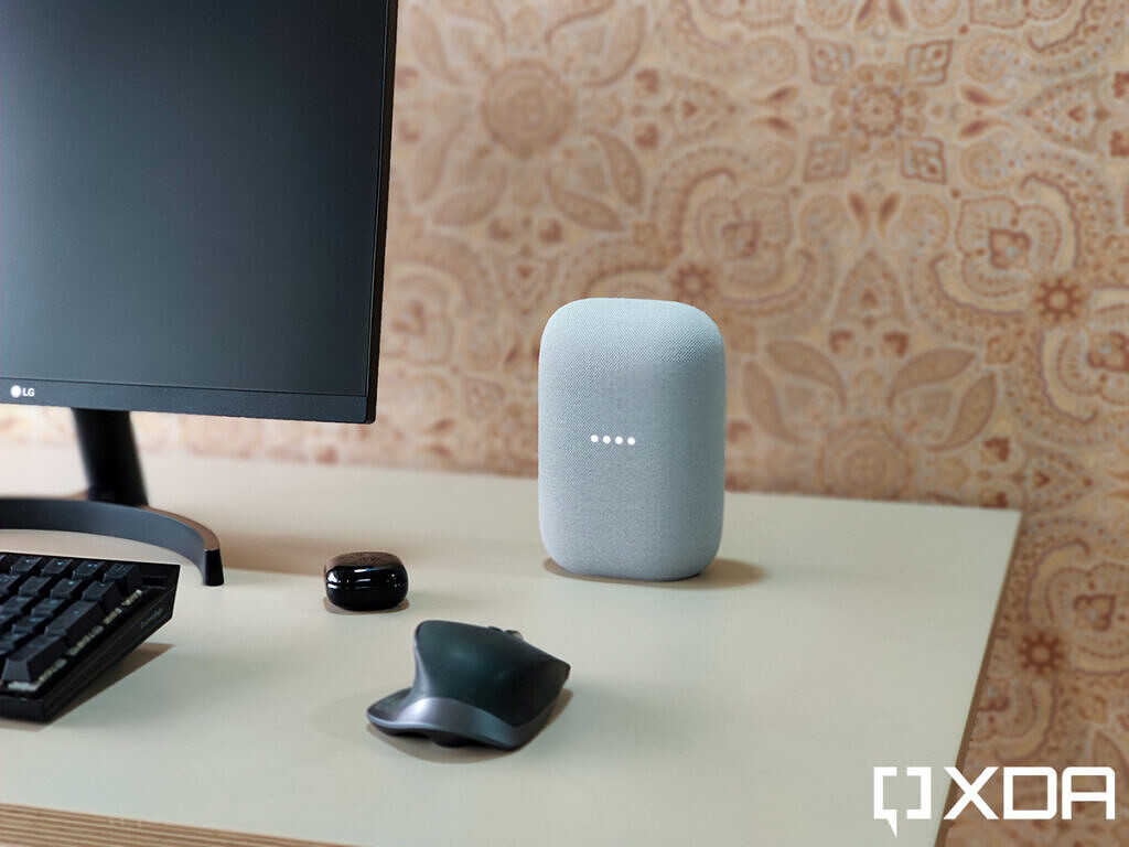 Google-Nest-Audio-XDA-Chalk-on-table-besides-monitor-samsung-galaxy-buds-live-logitech-mx-master-2s-mouse